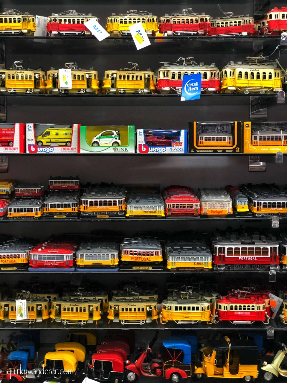 toy trams and vintage car models in Portugal